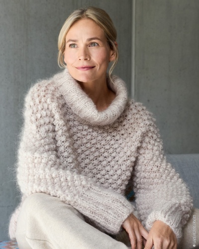 Artikelbild des Artikels “Rollkragenpulli Im Röschenmuster aus Mohair Moda “