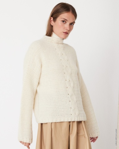 Artikelbild des Artikels “Häkelpullover Mit Zopfstreifen aus Nebbia “