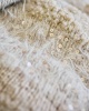 Artikelbild 4 des Artikels “Gestreifte Decke Mit Fransen Und Pailletten aus Winter Softness & Basta & Cosmo & Orsetto “