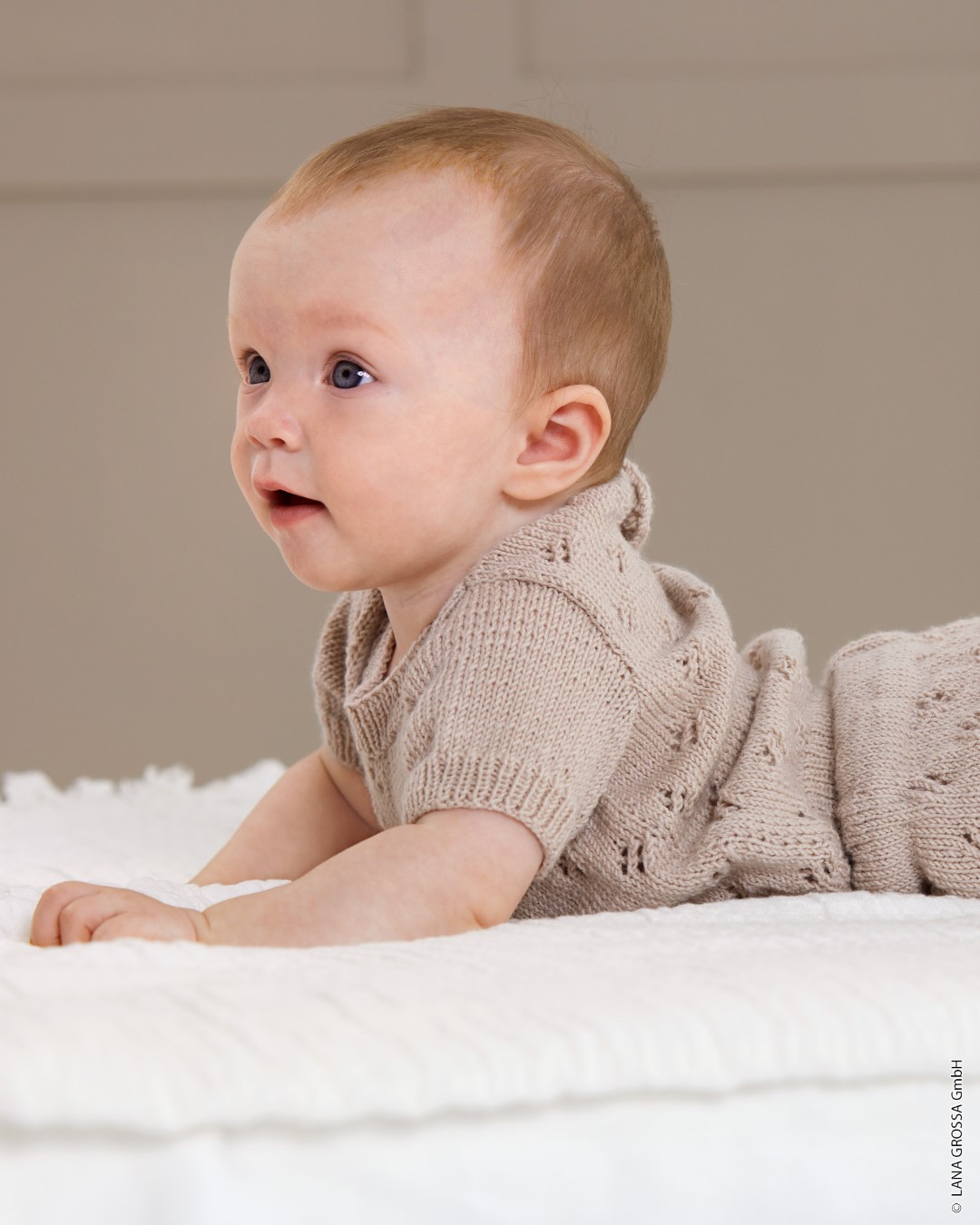 Artikelbild 1 des Artikels “Kurzarmpulli Mit Ajourmuster aus Cool Wool Baby “